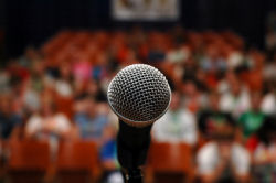 public-speaking-phobia-microphone-blurry-audience-conference-speaker