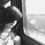Woman Sleeping on train tiredness insomnia sleep manchester counsellor